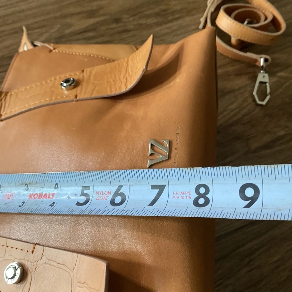 New with tags inside Leather Velez Columbia satchel w/crossbody strap Camel